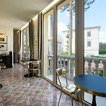 Kemani Sara - Boutique Couette-café Olbia